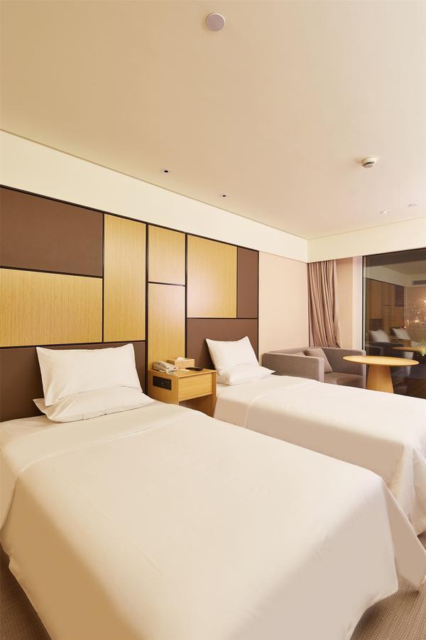 เจไอ โฮเทล ฮาร์บิน เวสต์ เรลเวย์สเตชั่น ว่านต้าพลาซา Hotel ภายนอก รูปภาพ