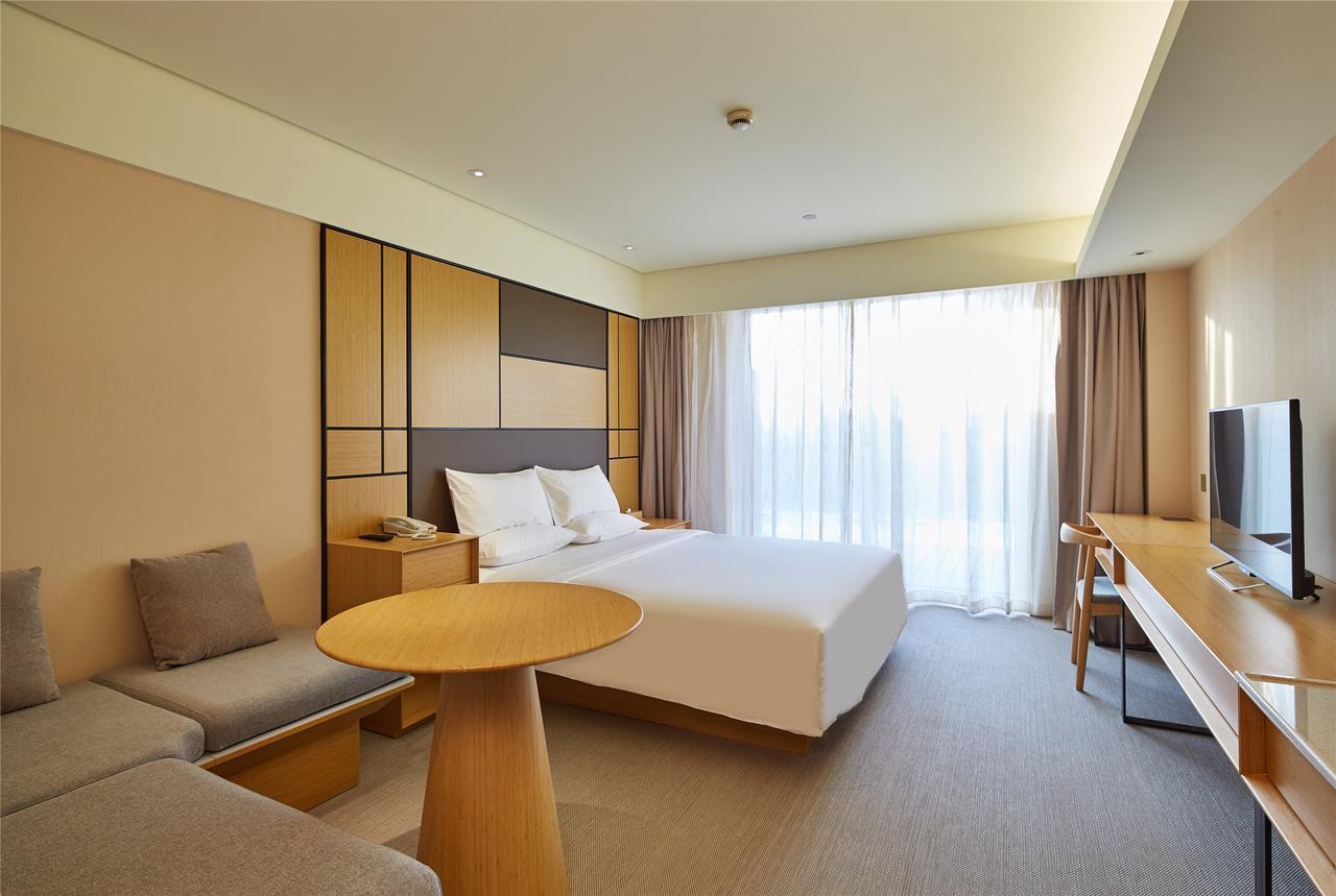 เจไอ โฮเทล ฮาร์บิน เวสต์ เรลเวย์สเตชั่น ว่านต้าพลาซา Hotel ภายนอก รูปภาพ